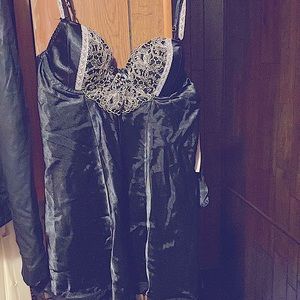 Never worn Two piece set black size medium. Has matching thong.